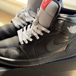 Jordan 1s  Black Leather High-Top Sneakers with White Laces